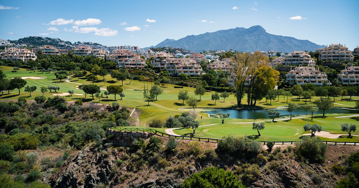 Marbella golf course with mountain backdrop, typical Costa del Sol residential setting