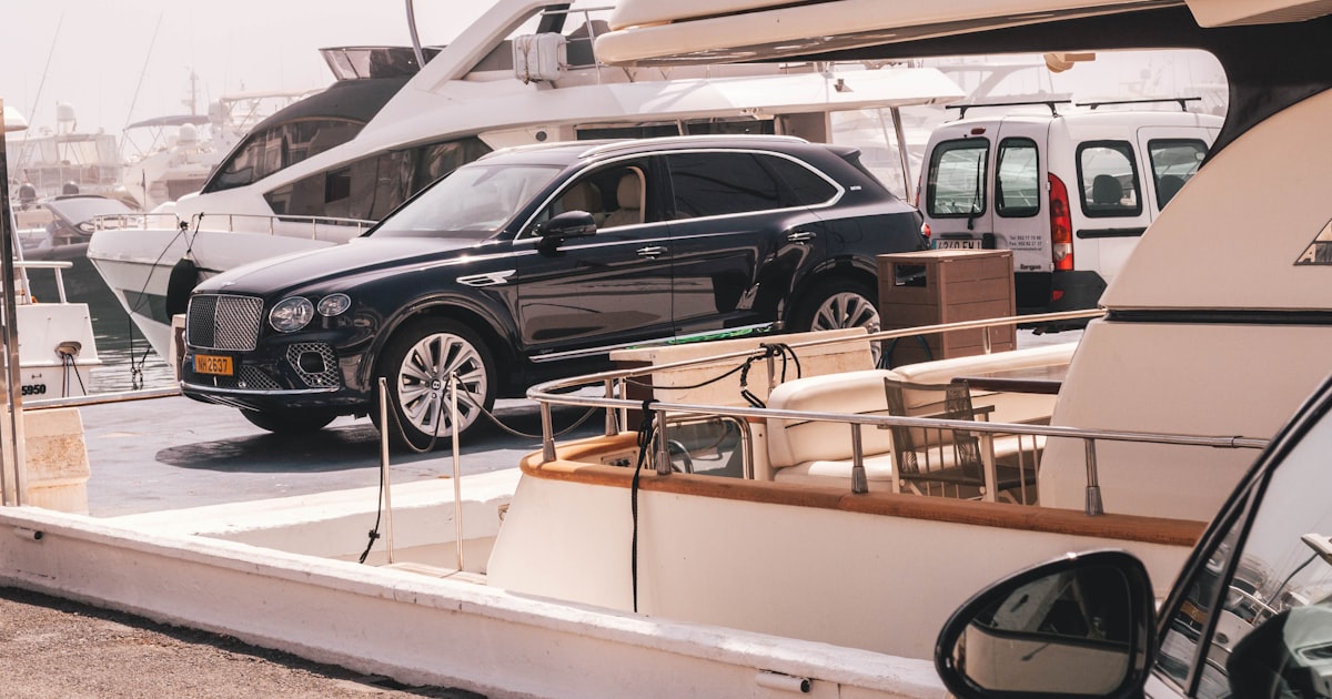 Luxury yacht with cars in Puerto Banús, Costa del Sol