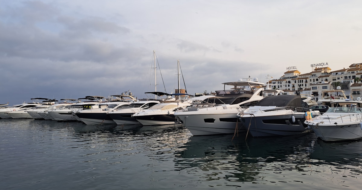 Marina with luxury yachts on the Costa del Sol — typical Marbella waterfront where many US buyers invest